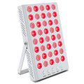 Red LED light therapy compact bedside panel on a white background