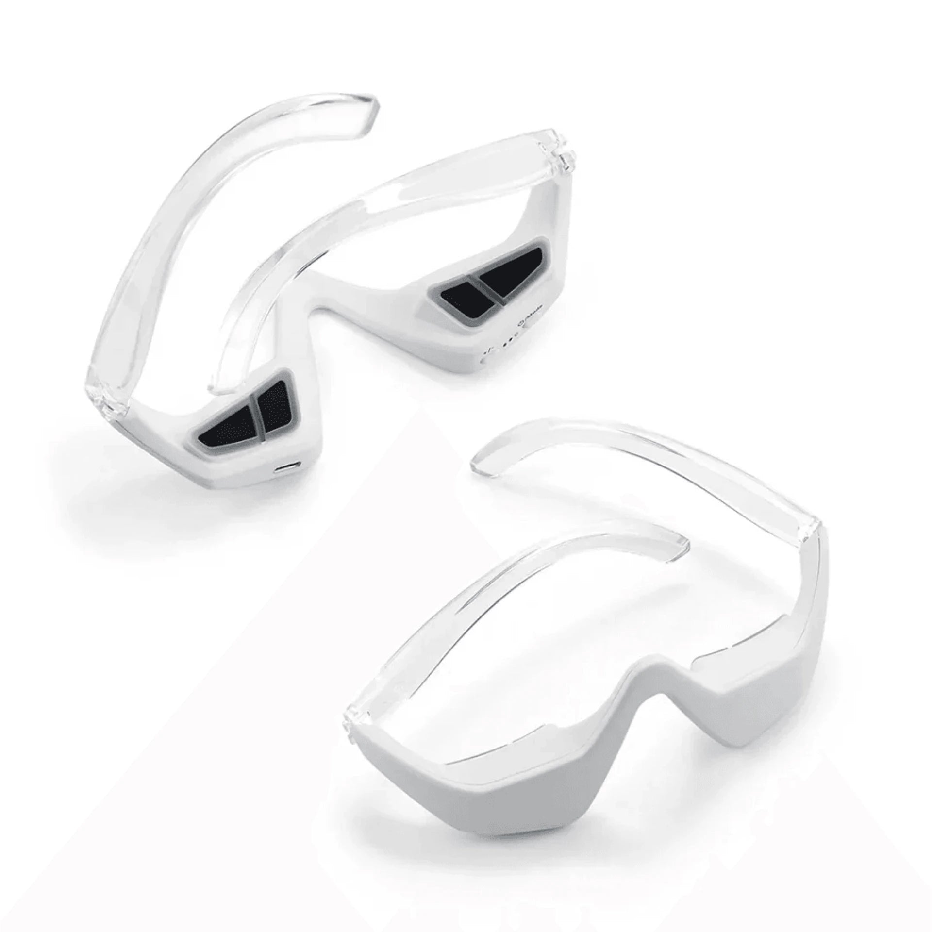 Red LED light therapy eye glasses on white background